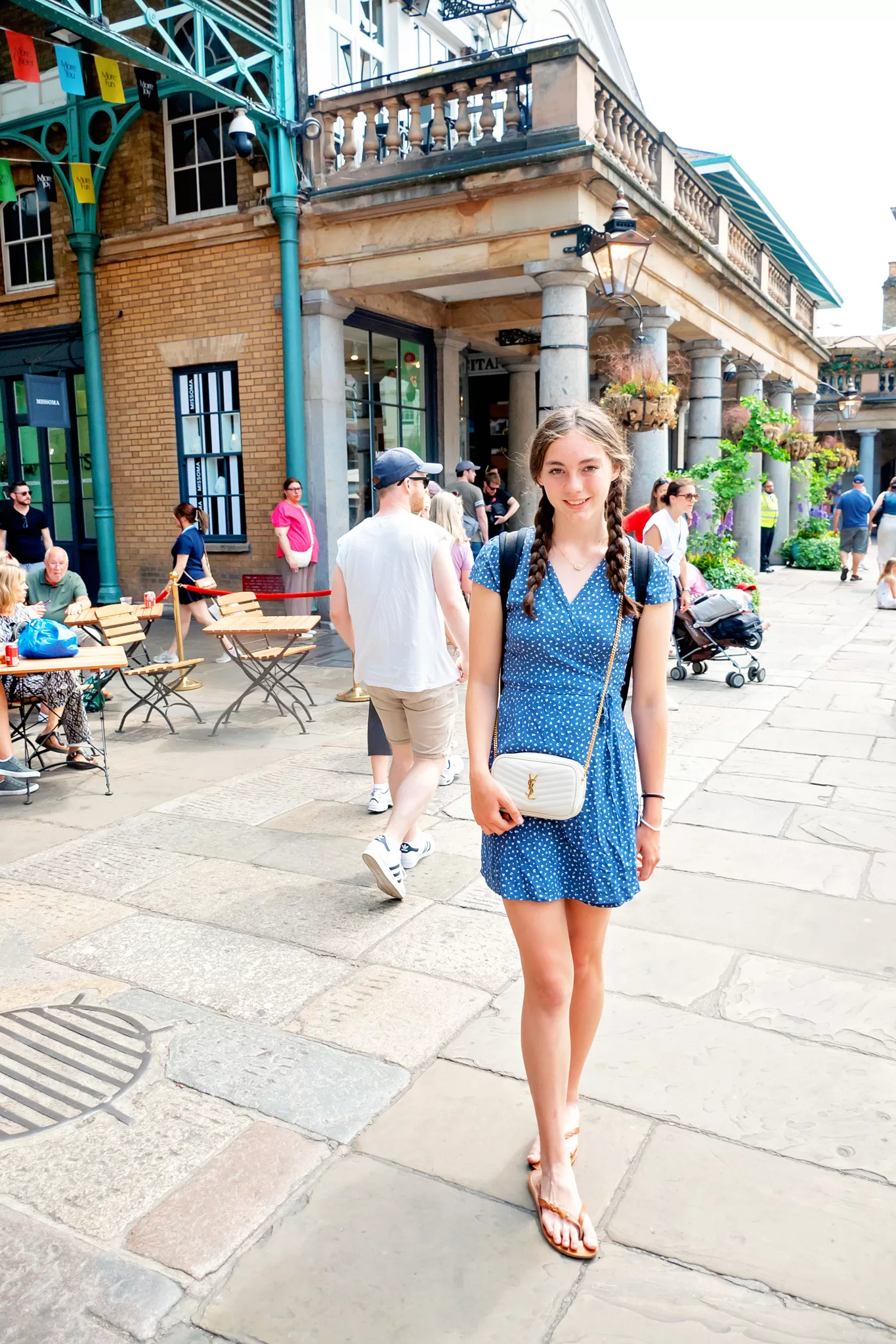 Girl in London wearing the YSL Lou Camera Bag.