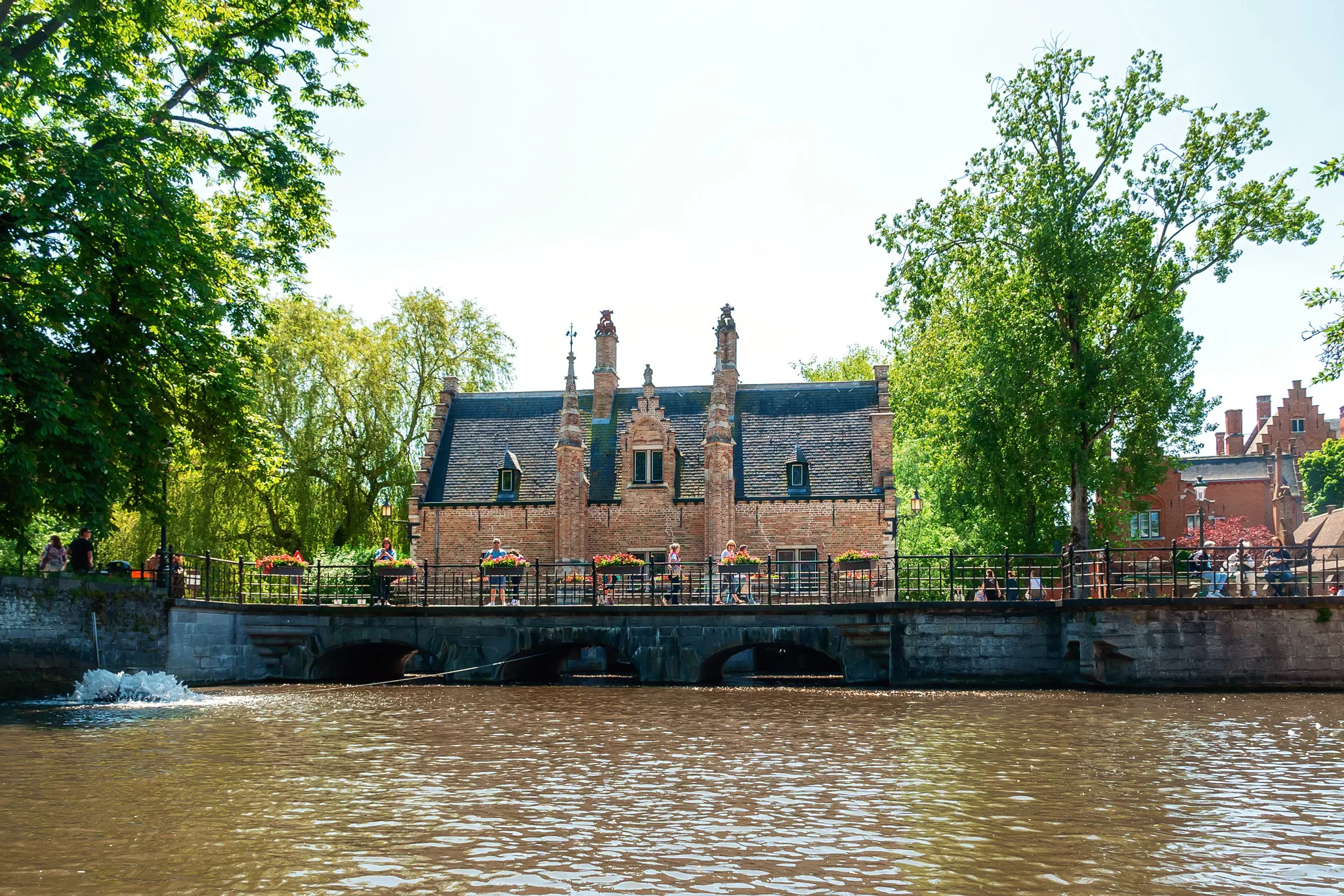 A canal tour, as shown in this tour, is a unique thing to do in Bruges