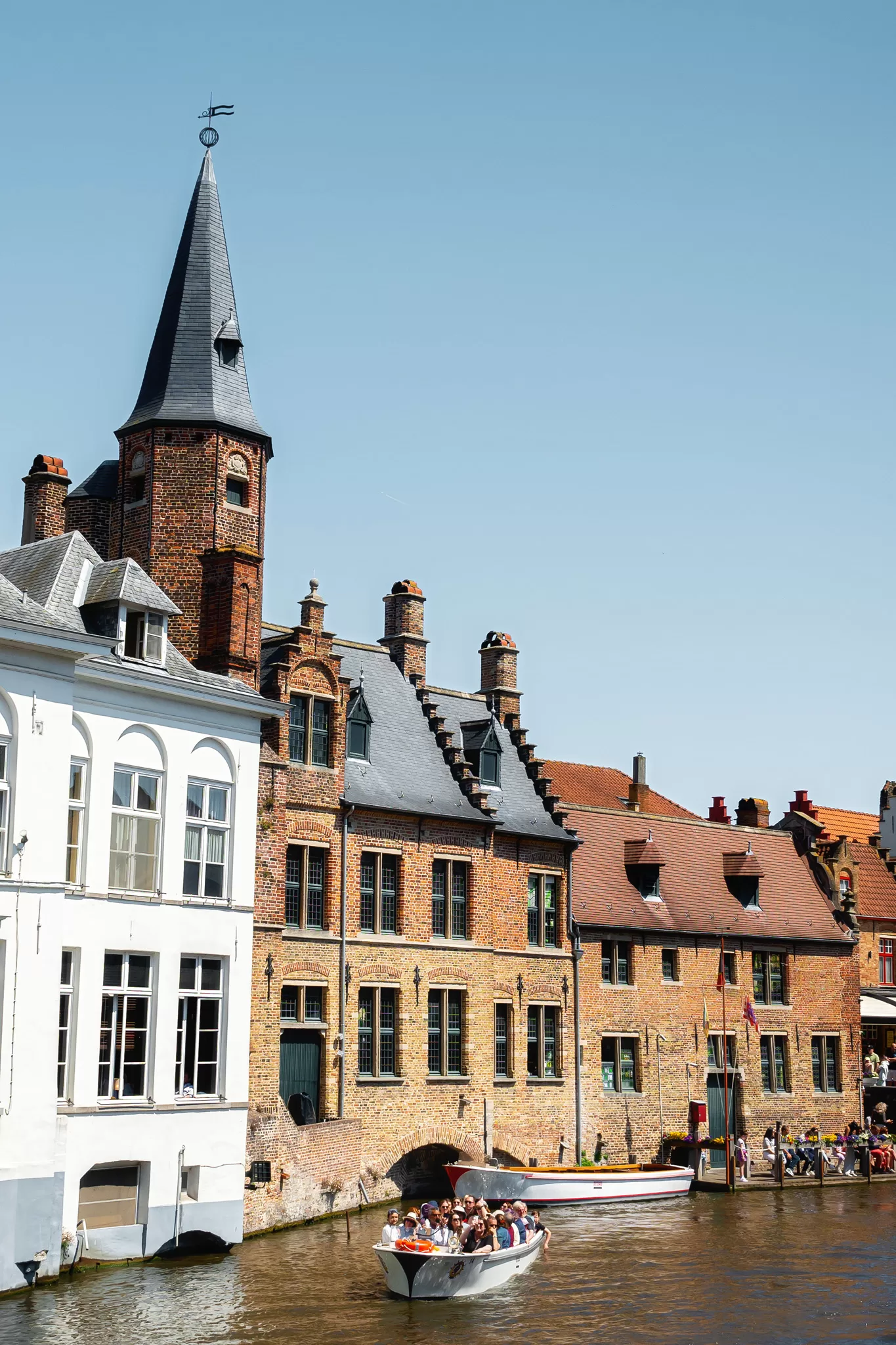 Instagram photo spot in Bruges. It shows historic Buildings in Brugges Belgium