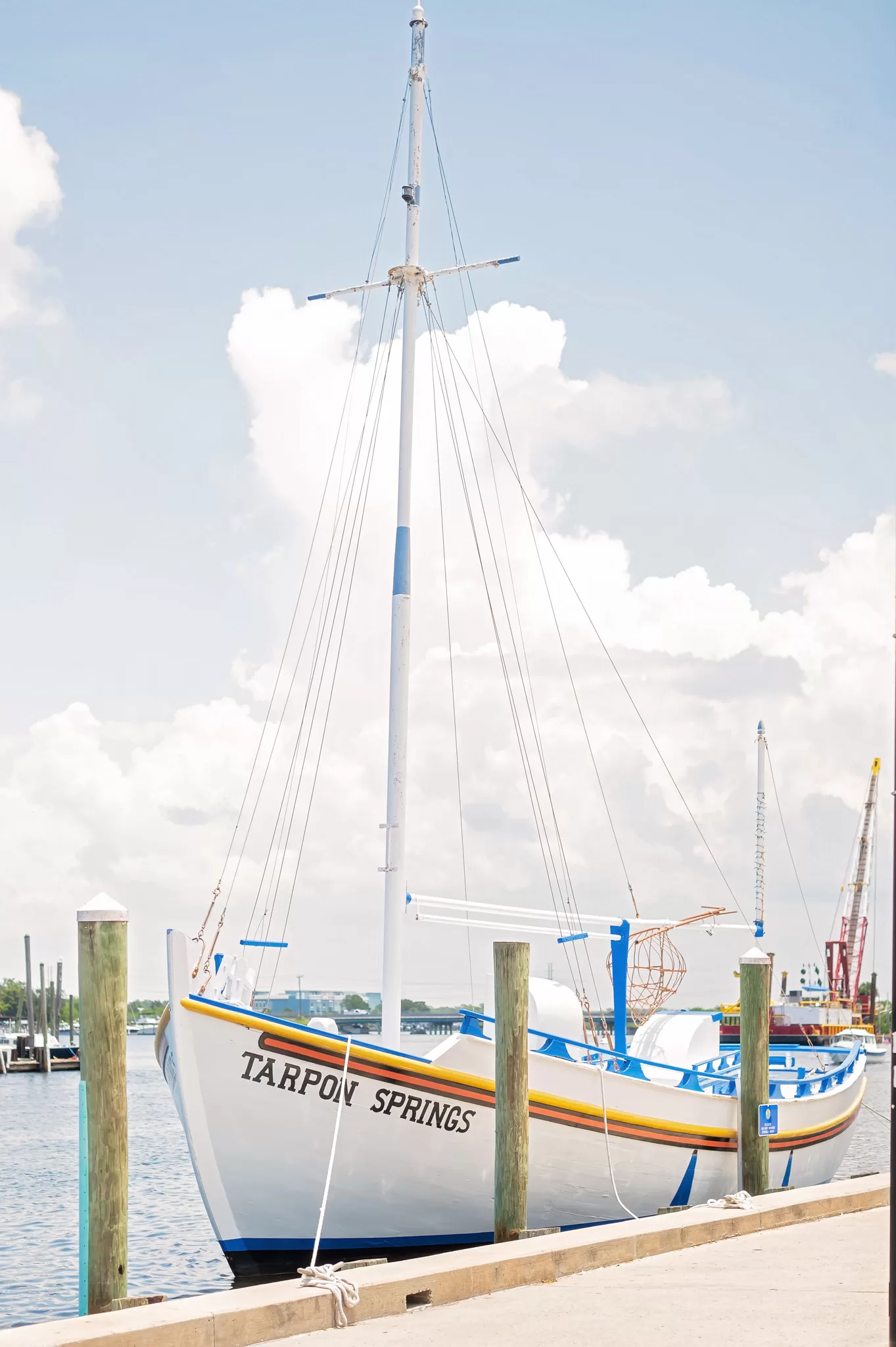 This image is for a blog post about Tarpon Springs Florida and shows a boat downtown that says Tarpon Springs.