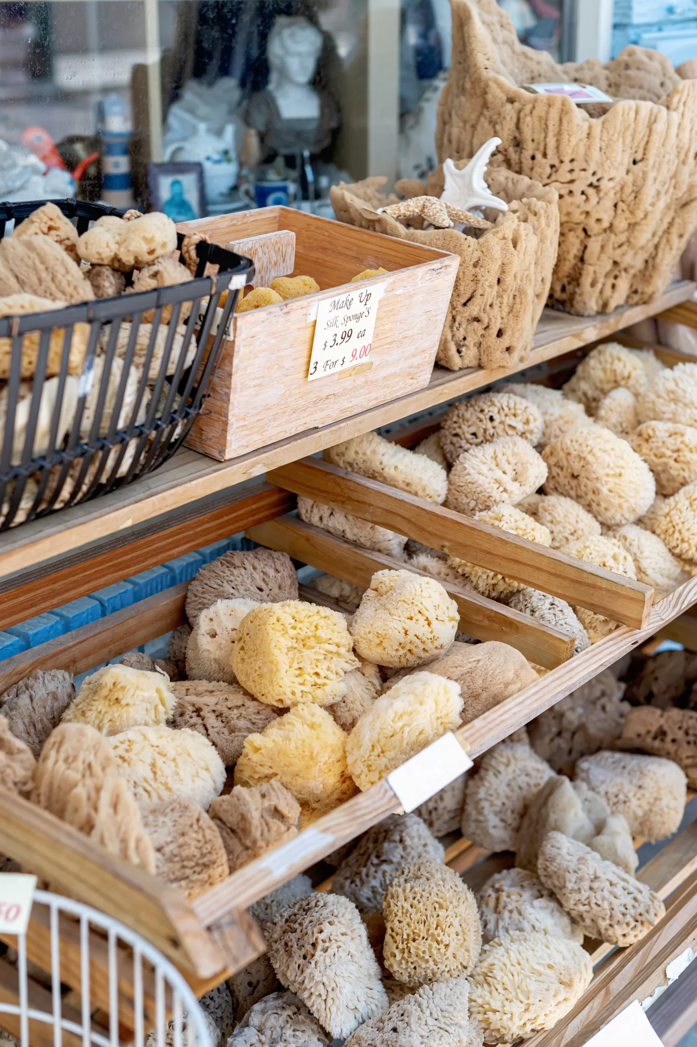 This image is for a blog post about Tarpon Springs Florida and shows sea Sponges for sale. 