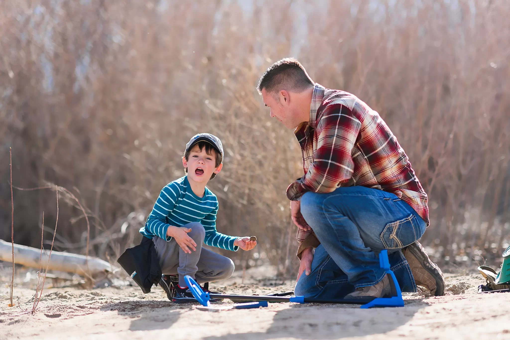 Boy Metal Detecting and Finding Something