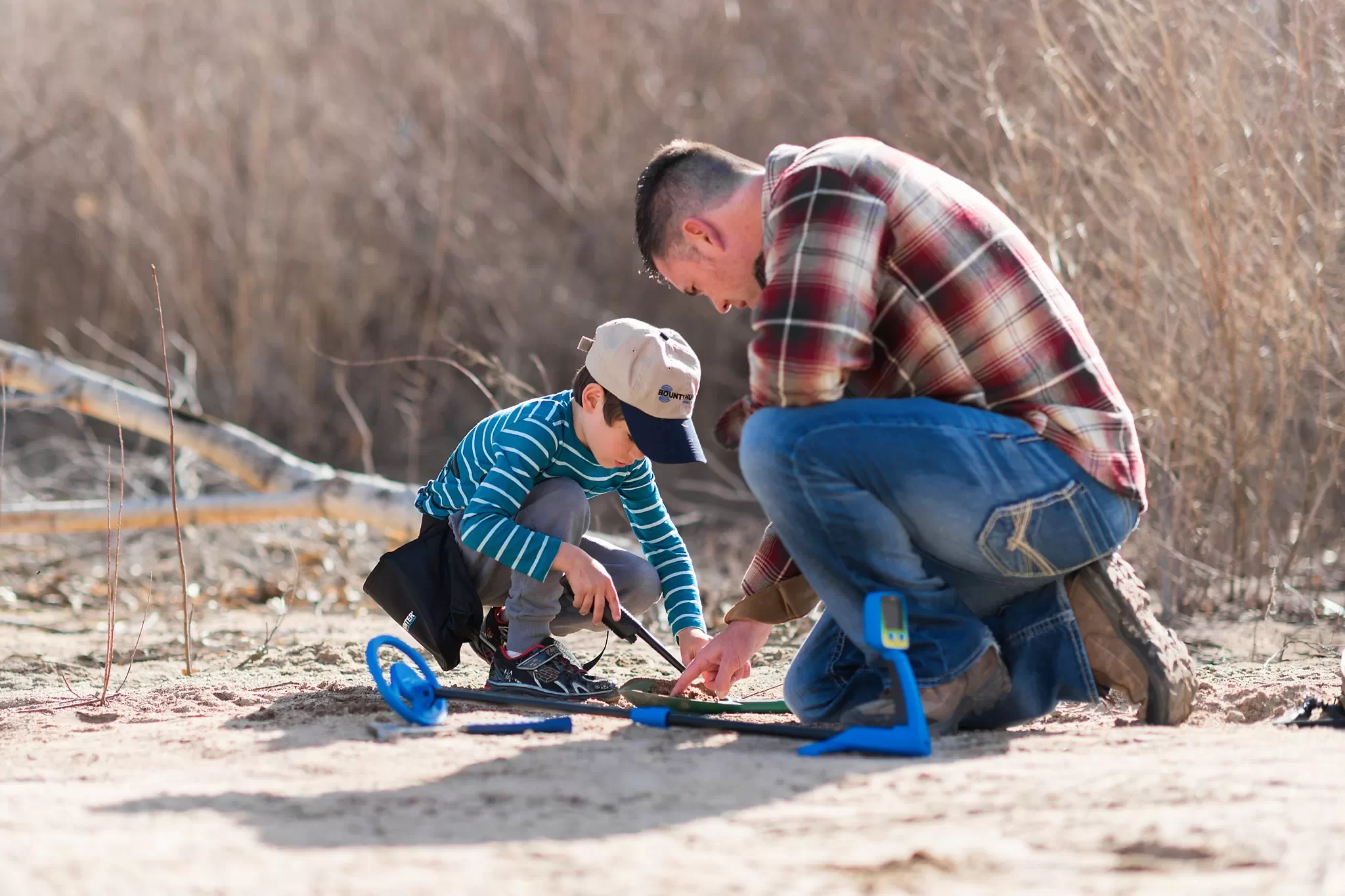 Boy Metal Detecting