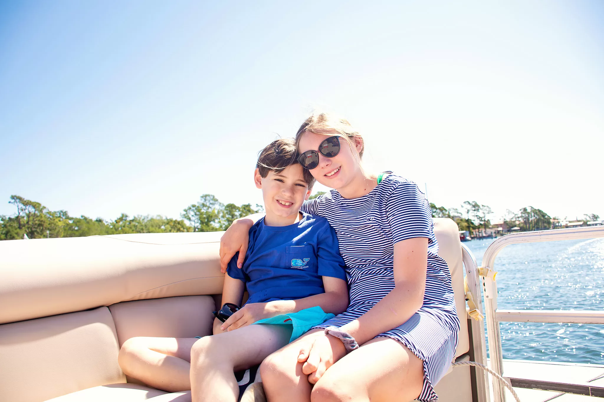 Kids in a pontoon boat