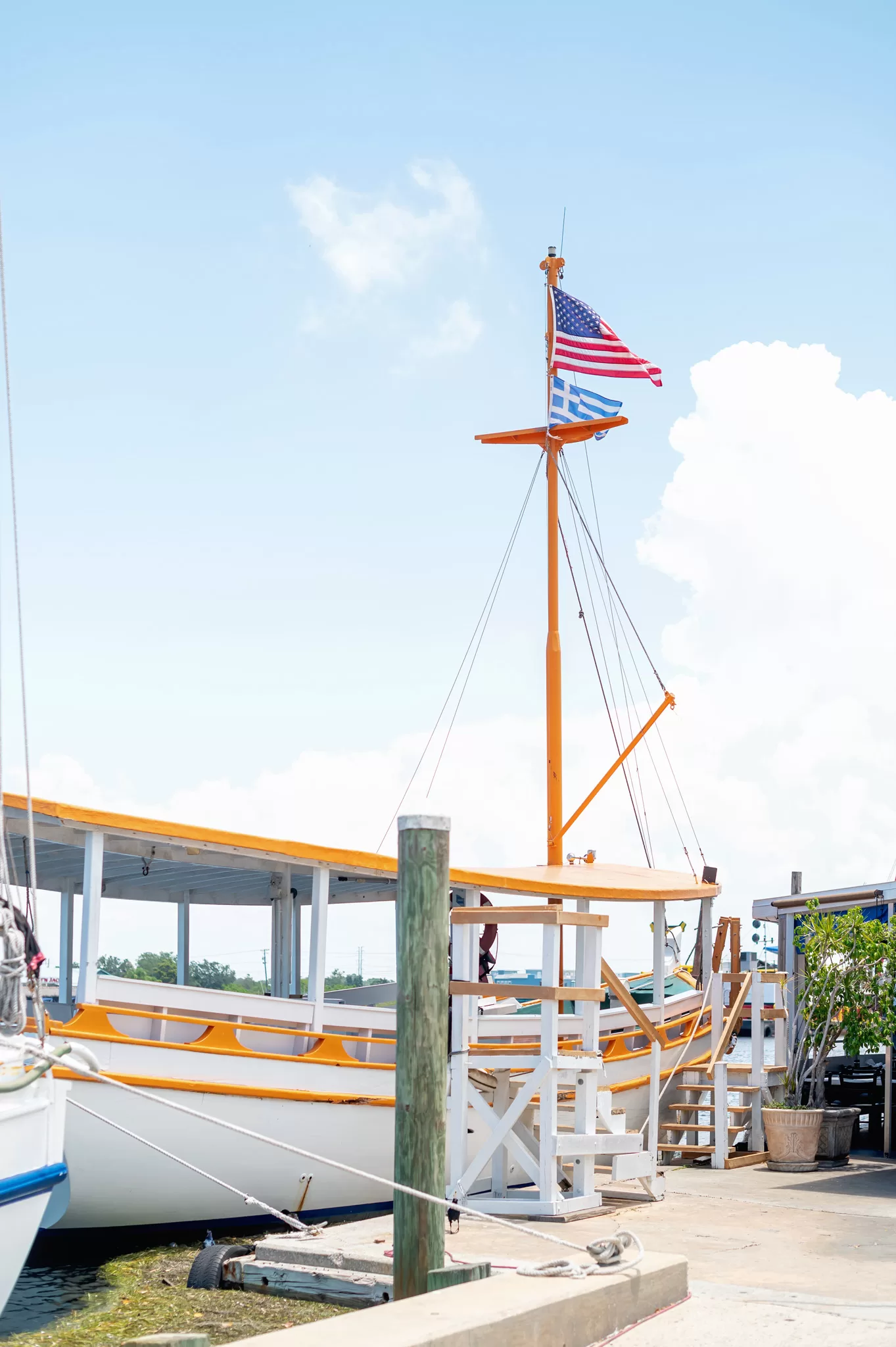 This image is for a blog post about Tarpon Springs Florida and shows a greek sponge boat moored downtown.
