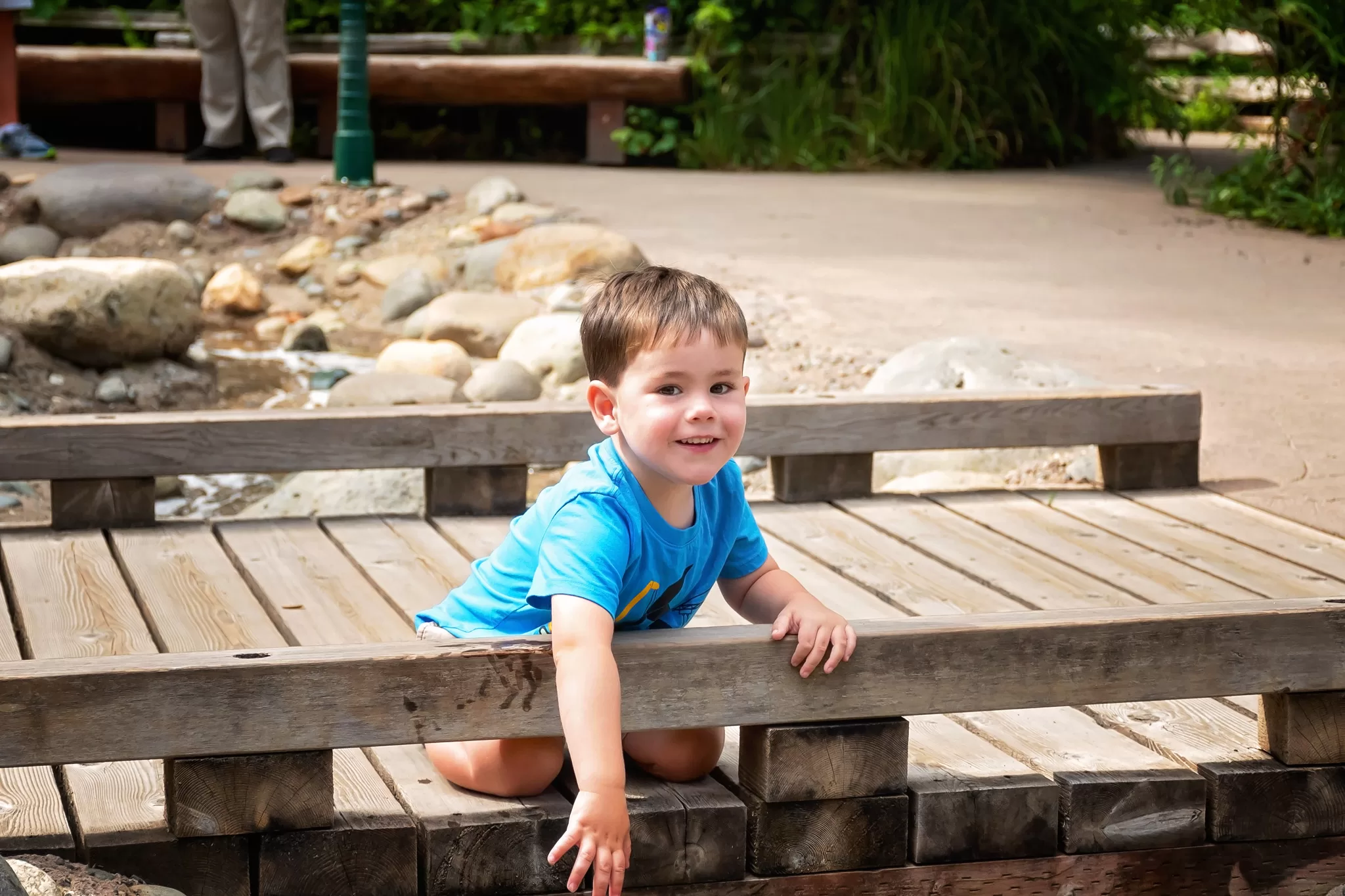 A young boy playing on a bridge at Northwest Trek Wildlife Park