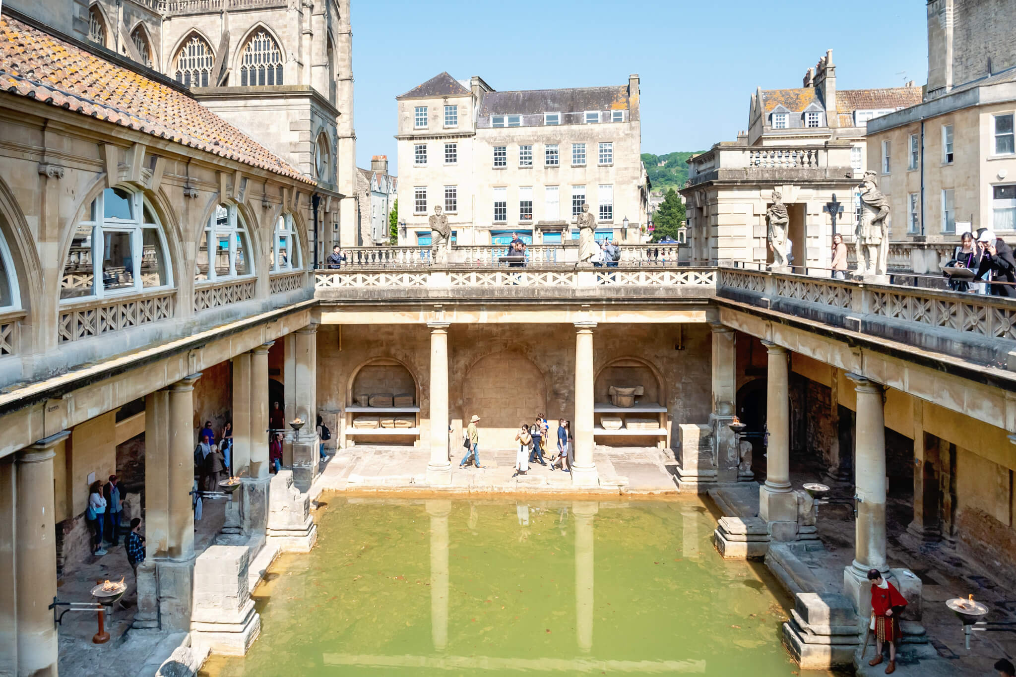 ancient roman baths in Bath England with green water