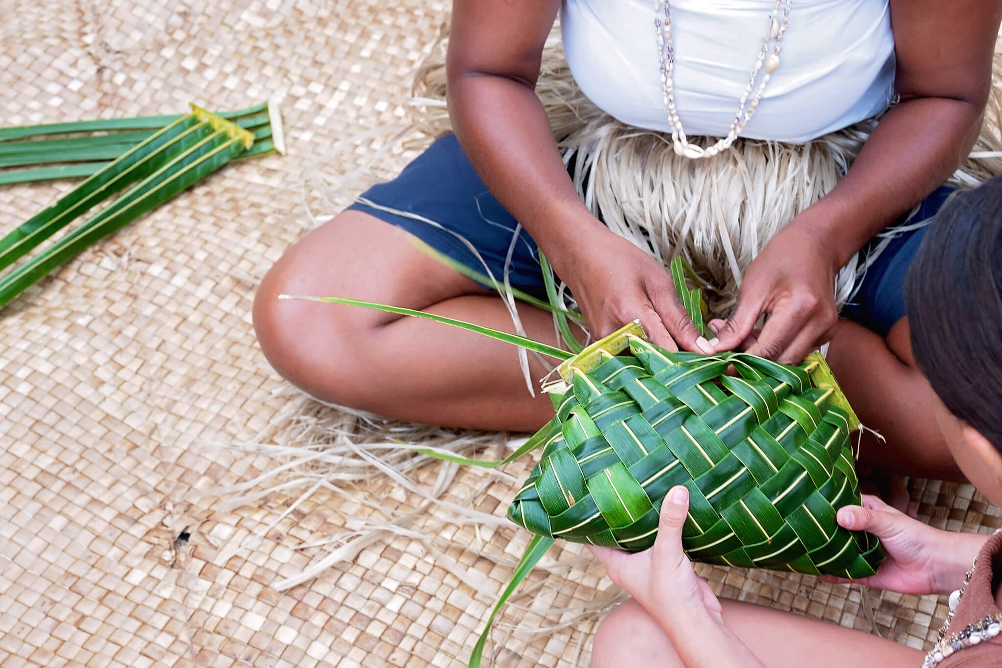 weaving on a family trip To Fiji