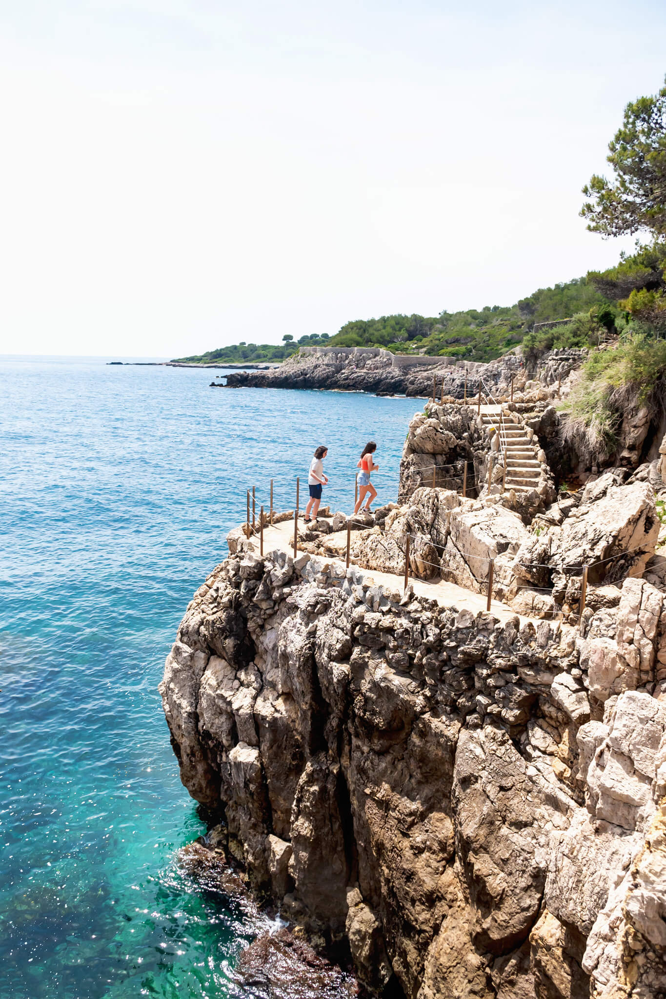 Kids walking the path along the Cap d'Antibes Hike in Antibes France