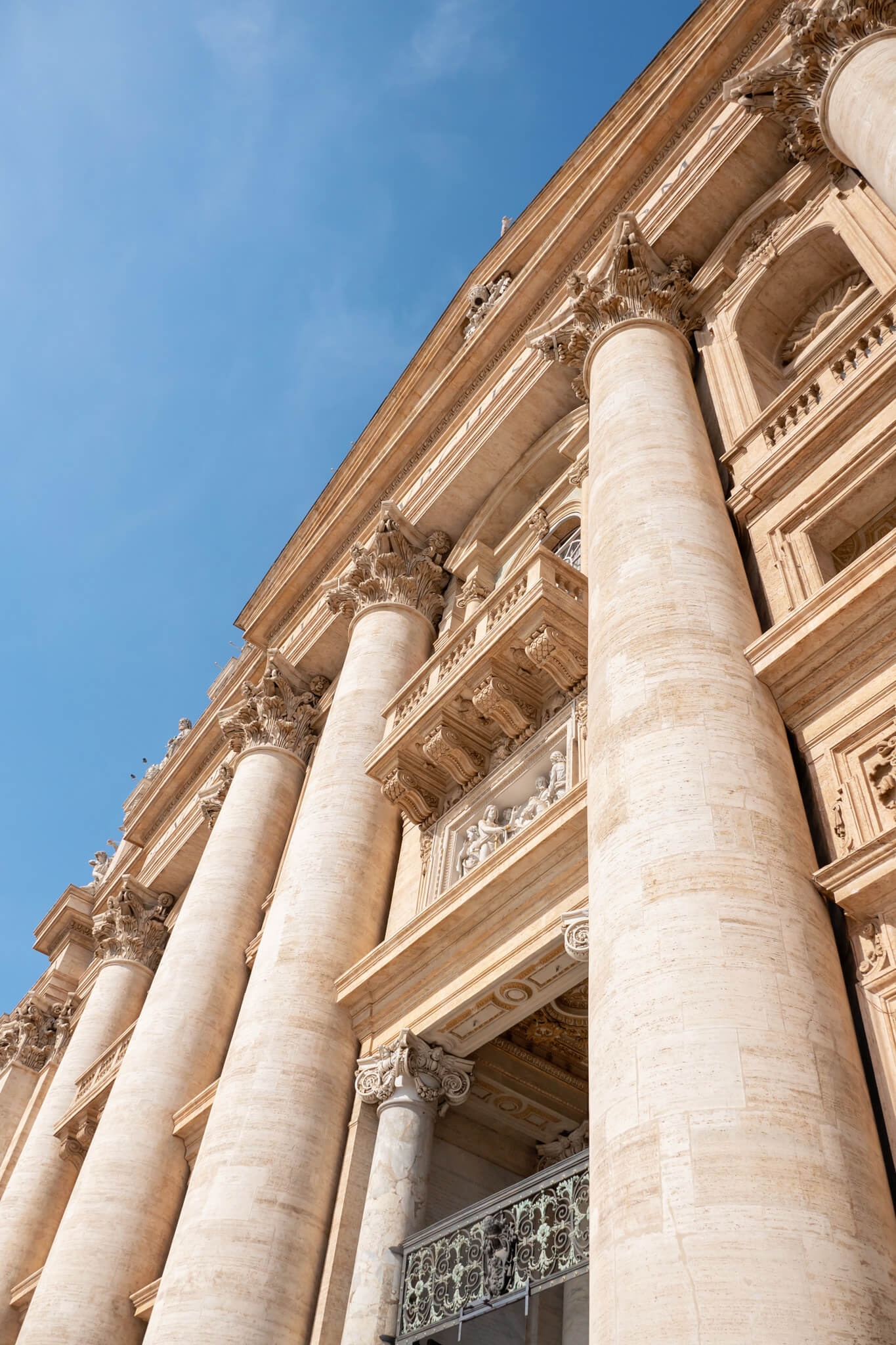 The outside of St Peters Basilica Vatican City Rome Showing the Balcony where the Pope stands