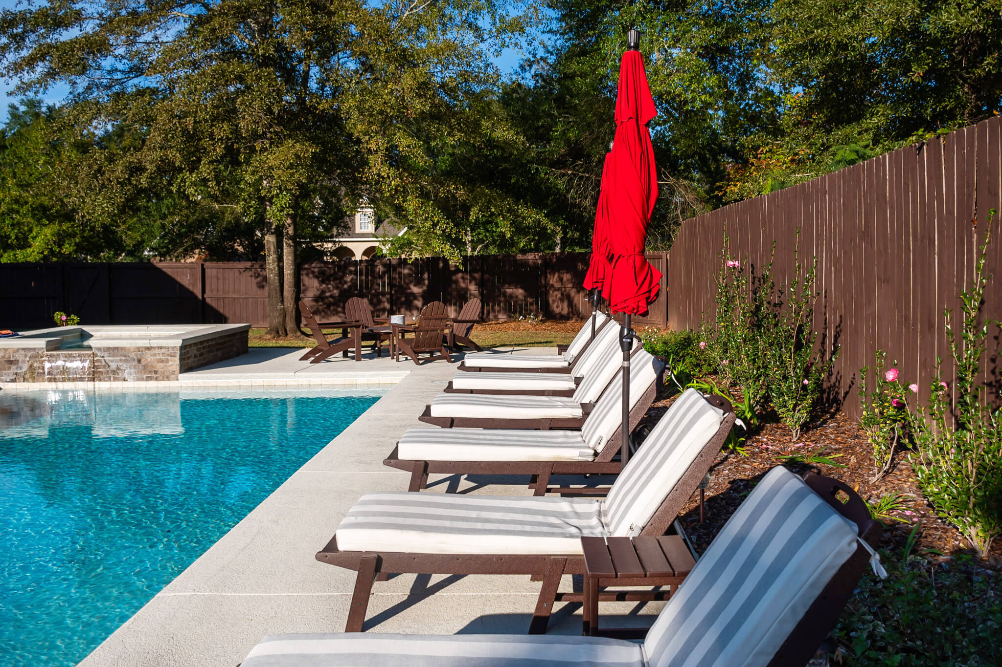 Backyard Furniture From Wayfair feat Polywood loungers and cushions