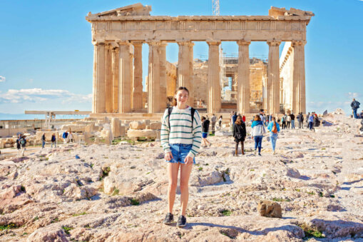 A girl at the Acropolis on of of the Athens tours of the Pantheon