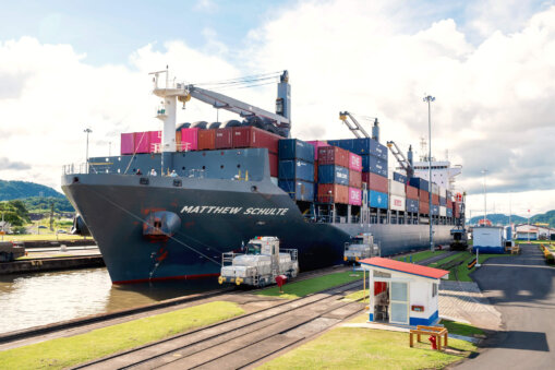 A Container ship crossing the Miraflores Locks as seen from a Panama Canal Tour (Panama Travel Guide)