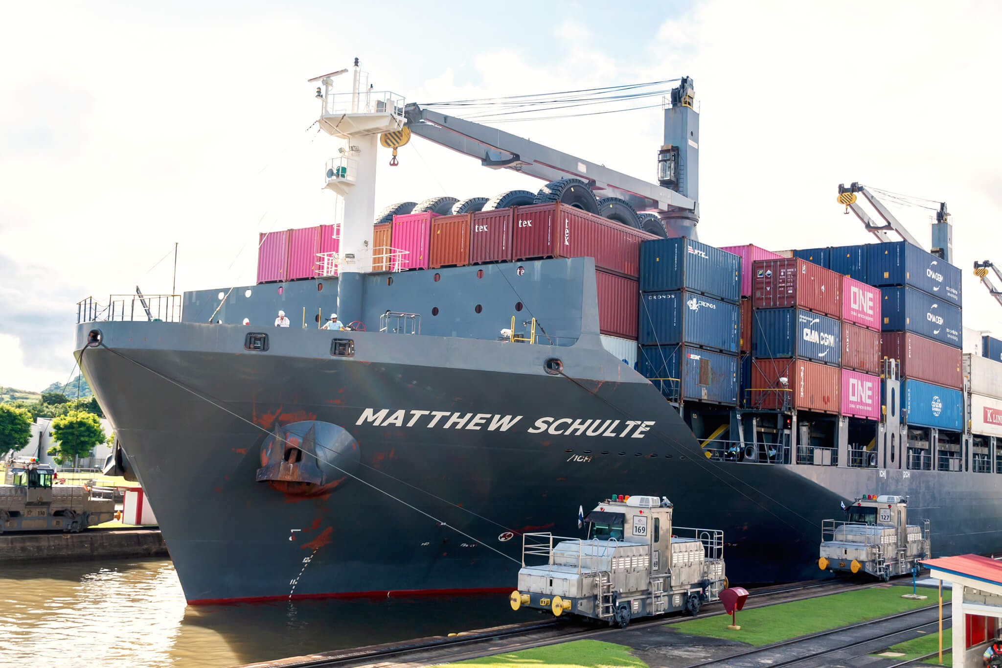 A container ship crossing the Miraflores Locks as seen from a Panama Canal Tour