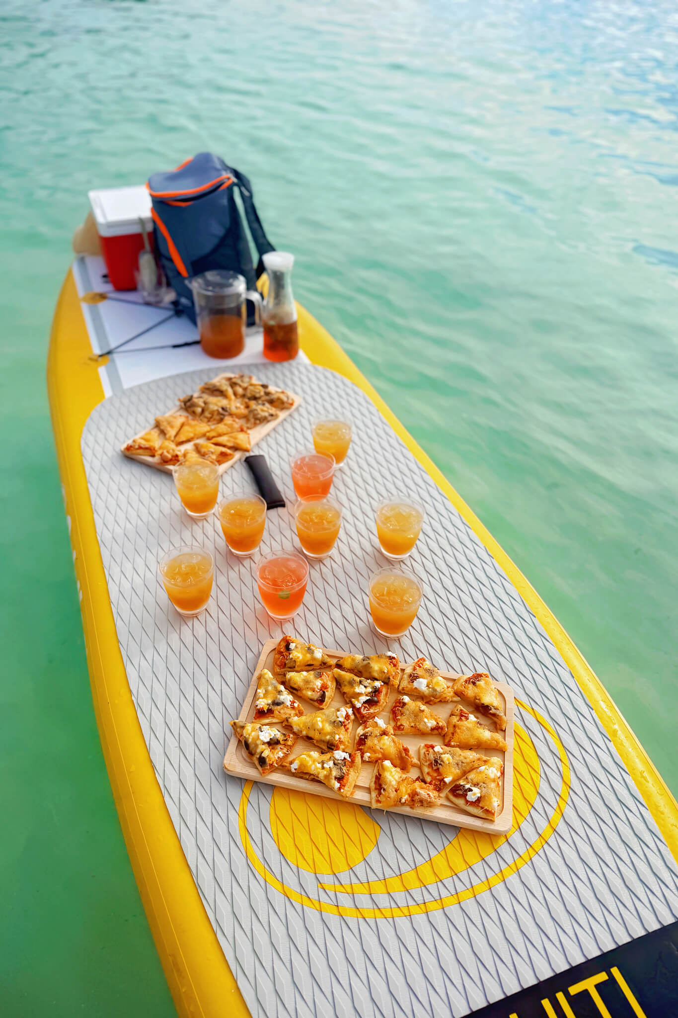 the paddle board meeting on our Antigua Tradewinds Mohala Sailing