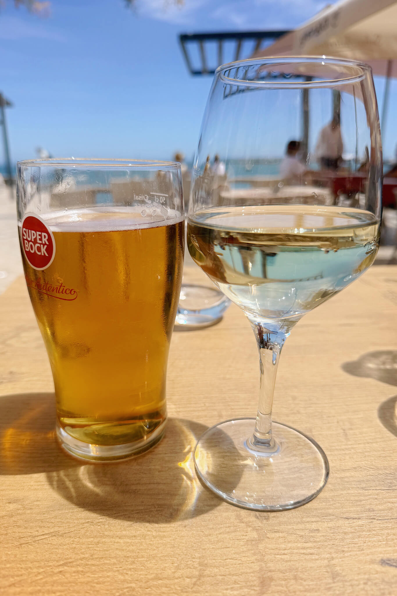 Drinking Superbock and Vinho Verde on the promendade in Cascais