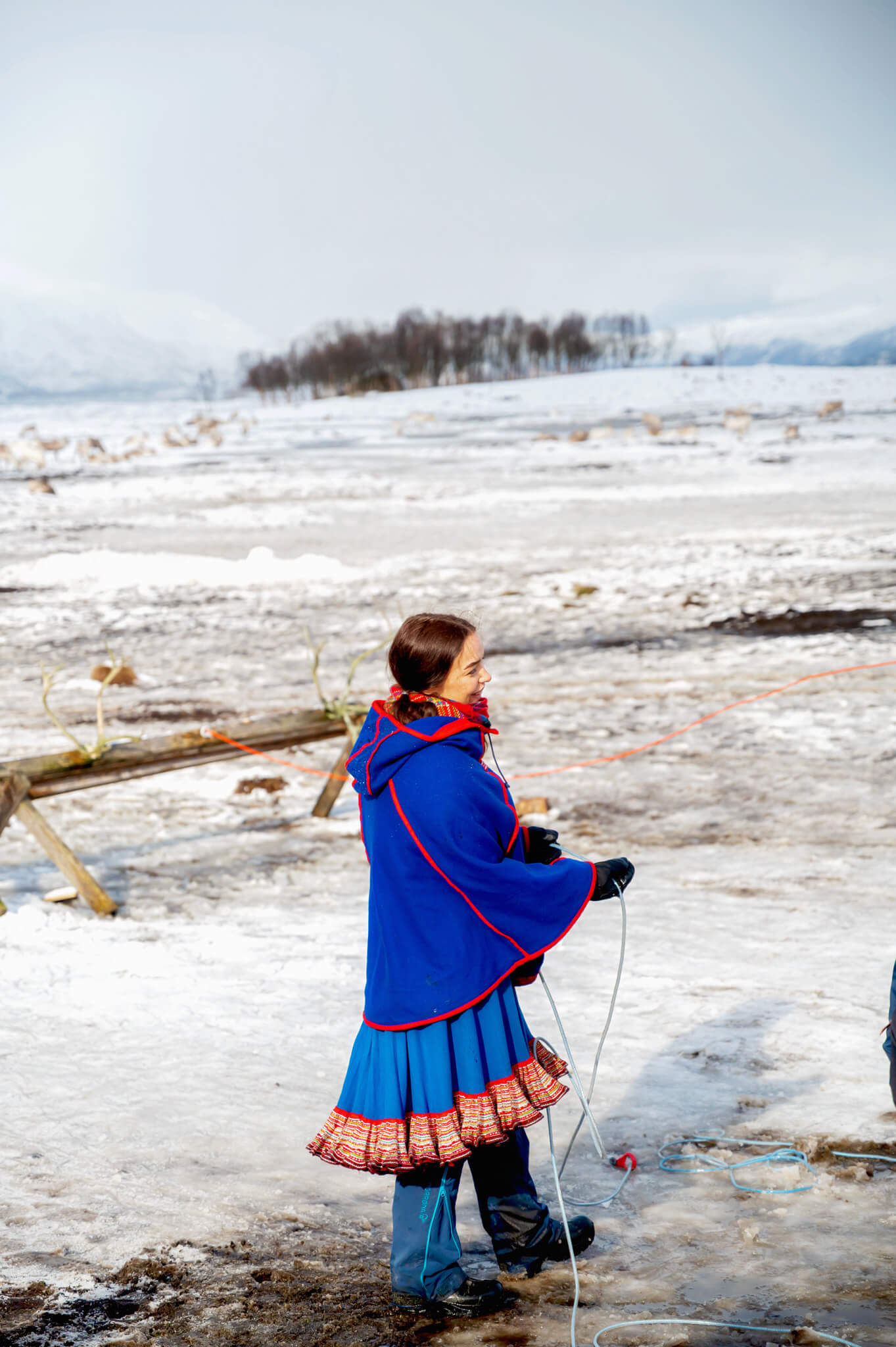 Tromso Norway 58 • Our Little Lifestyle Sami girl at the Tromso Arctic Reindeer Feeding Experience
